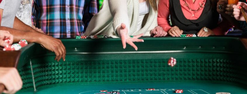 Close Up Of People Playing Craps